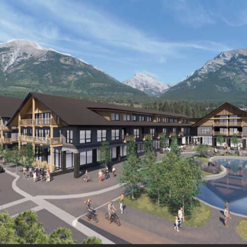 A rendered view of the Tamarack Lodge in Canmore, Alberta, with the Canadian Rockies in the background and the large feature pond in the forefront.