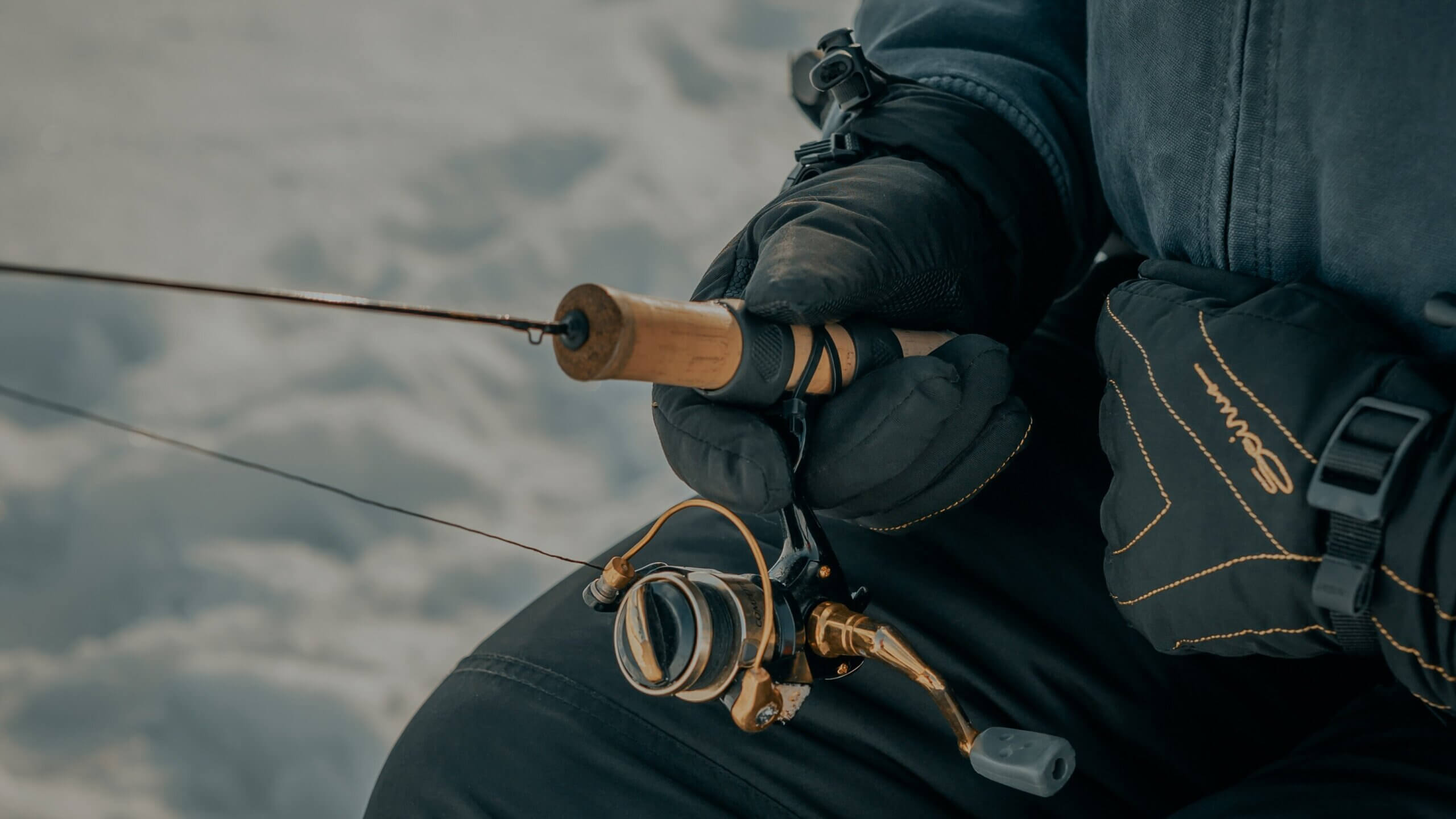 close up of a man ice fishing